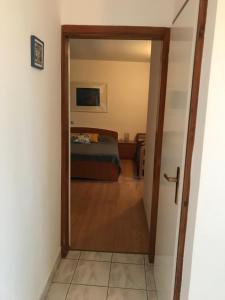 Ein Bett oder Betten in einem Zimmer der Unterkunft Apartmenthaus"Kala"