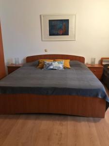 Ein Bett oder Betten in einem Zimmer der Unterkunft Apartmenthaus"Kala"