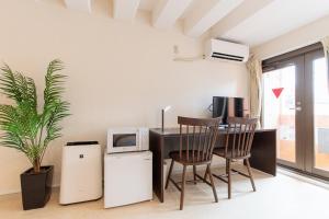Kuchyň nebo kuchyňský kout v ubytování LUANAHOTEL IN NAKANO