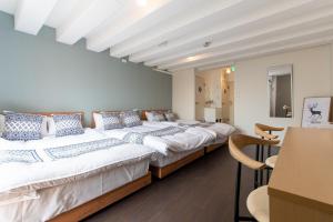 Postel nebo postele na pokoji v ubytování LUANAHOTEL IN NAKANO