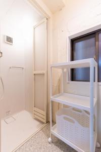 Postel nebo postele na pokoji v ubytování LUANAHOTEL IN NAKANO