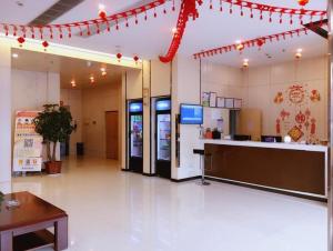 a lobby of a store with a cashier and a counter at 7Days Inn Yancheng Jianhu Xiu Fu South Road in Yancheng