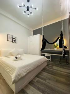 Postel nebo postele na pokoji v ubytování Dylan Hotel