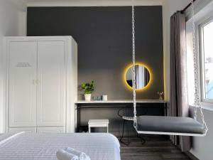 Postel nebo postele na pokoji v ubytování Dylan Hotel