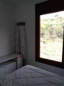 Tempat tidur dalam kamar di Paraíso de Torrox Costa