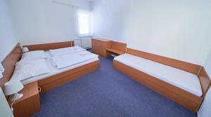 Letto o letti in una camera di Hotel Astra