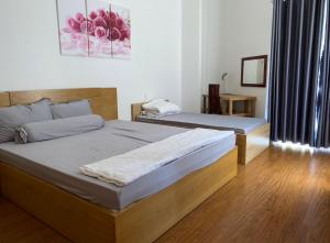 Postel nebo postele na pokoji v ubytování Pho Bien Homestay + 25 fotografií