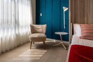 Cama ou camas em um quarto em NC Square Shinjuku -All Suite Residence-