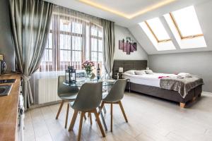 Posteľ alebo postele v izbe v ubytovaní Apartamenty hoteLOVE na Skale