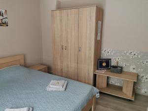 Postel nebo postele na pokoji v ubytování Apartmani Milica
