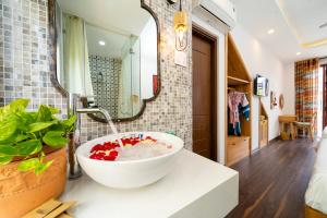 Fotografie z fotogalerie ubytování An Nhien Boutique Villa v destinaci Hoi An + 37 fotografií