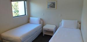 Postel nebo postele na pokoji v ubytování Shadzz Motel