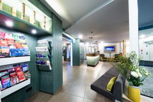 a lobby of a pharmacy with a waiting room at fjord hotel berlin in Berlin