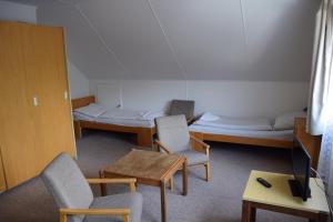 Postel nebo postele na pokoji v ubytování Chaty Kotárky