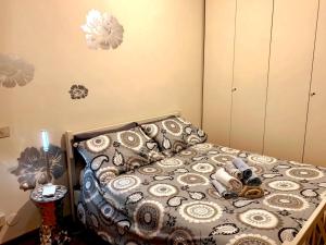 Cama o camas de una habitación en Peony Apartment, bi-locale a due passi dal centro di Modena