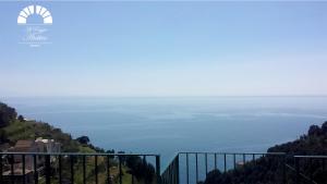 a view of the ocean from the top of a hill at Al Poggio Antico in Amalfi