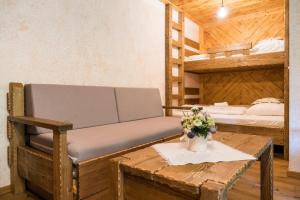 A bed or beds in a room at Salaš Syrex