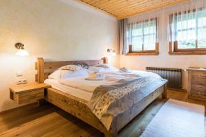 A bed or beds in a room at Salaš Syrex