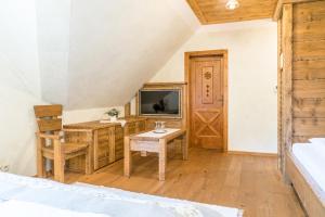 A bed or beds in a room at Salaš Syrex