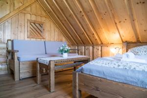 A bed or beds in a room at Salaš Syrex