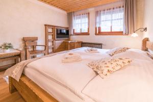 A bed or beds in a room at Salaš Syrex