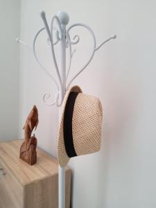 a lamp with a heart on the wall at Nefeli in Livadi