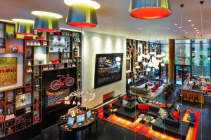 a store with a room filled with lots of items at citizenM New York Times Square in New York