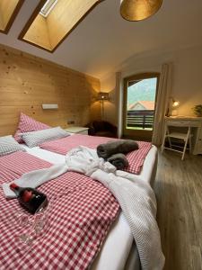 Postel nebo postele na pokoji v ubytování Alpinhotel INzeller