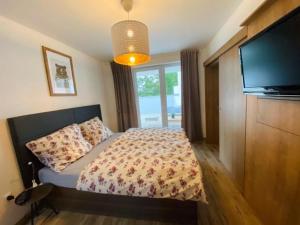 Postel nebo postele na pokoji v ubytování Dream apartman