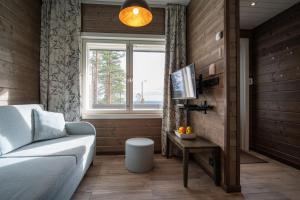 Svetainės erdvė apgyvendinimo įstaigoje Ski-Inn PyhäLinna