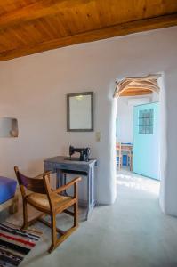 TV a/nebo společenská místnost v ubytování Dimitrakis Guesthouse