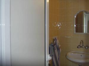 Een badkamer bij Guest house Horizont