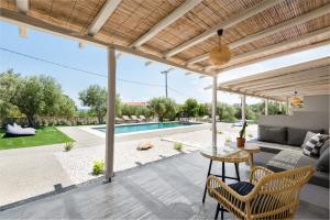 Photo de la galerie de l'établissement "Four Olives" Luxury Rooms, Afitos #FeelsLikeHome, à Afytos