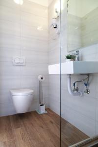 Koupelna v ubytování Milla Rooms