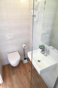 Koupelna v ubytování Milla Rooms