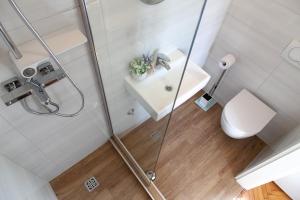 Koupelna v ubytování Milla Rooms + 21 fotografií