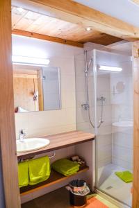 a bathroom with a sink and a shower at Gasthof Pension Lanzenhof in Going am Wilden Kaiser