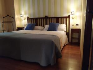 Giường trong phòng chung tại Hotel Palaterna