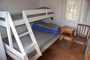 Postel nebo postele na pokoji v ubytování Kapellskärs camping