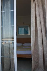 Postel nebo postele na pokoji v ubytování Villa Slavka