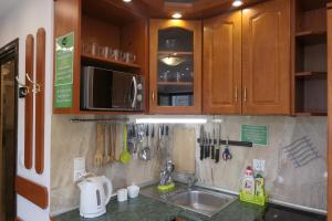 Kuchyňa alebo kuchynka v ubytovaní Apartamenty u Łukasza