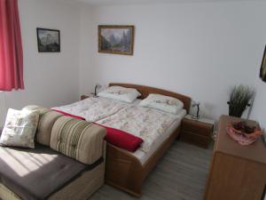 Posteľ alebo postele v izbe v ubytovaní Ferienwohnung Huber