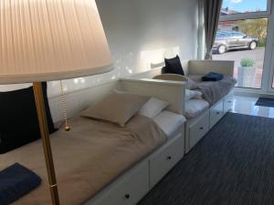 Voodi või voodid majutusasutuse Vid Gekås Ullared Boende B&B toas