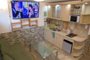 Kuchyňa alebo kuchynka v ubytovaní Apartamenty u Łukasza