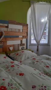 Postel nebo postele na pokoji v ubytování Apartments in Villa Crusca