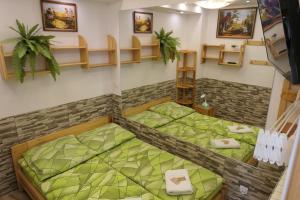 Posteľ alebo postele v izbe v ubytovaní Apartamenty u Łukasza