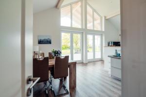 Η κουζίνα ή μικρή κουζίνα στο Ferienhaus Loheide - mit Sauna