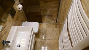 Kúpeľňa v ubytovaní Apartamenty u Łukasza