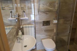 Kúpeľňa v ubytovaní Apartamenty u Łukasza