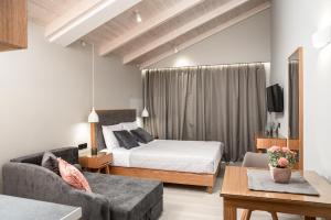 Katil atau katil-katil dalam bilik di Alektor Luxury Apartments